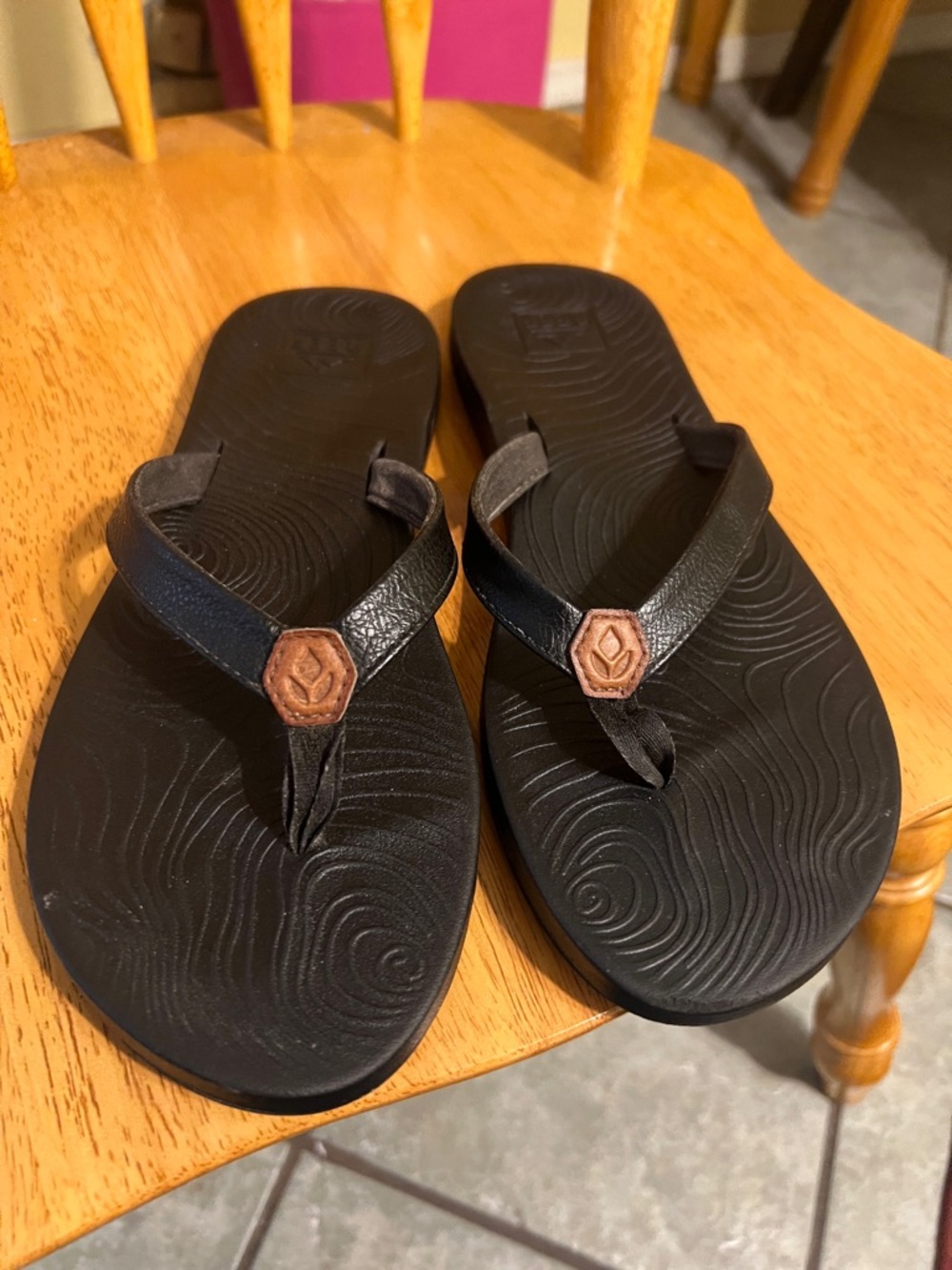Reef Women's Black Flip Flop Sandals with Brown Logo Accent